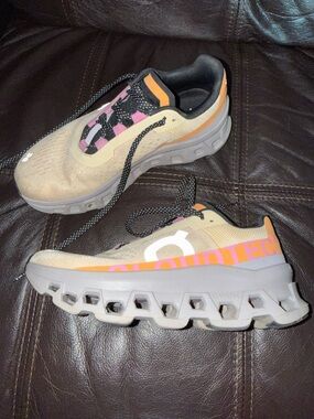 On Running Light Yellow Trainers with Pink & Orange Accents